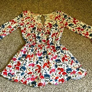 Ladies bright floral size XS American Ragle Romper. Elastic waist